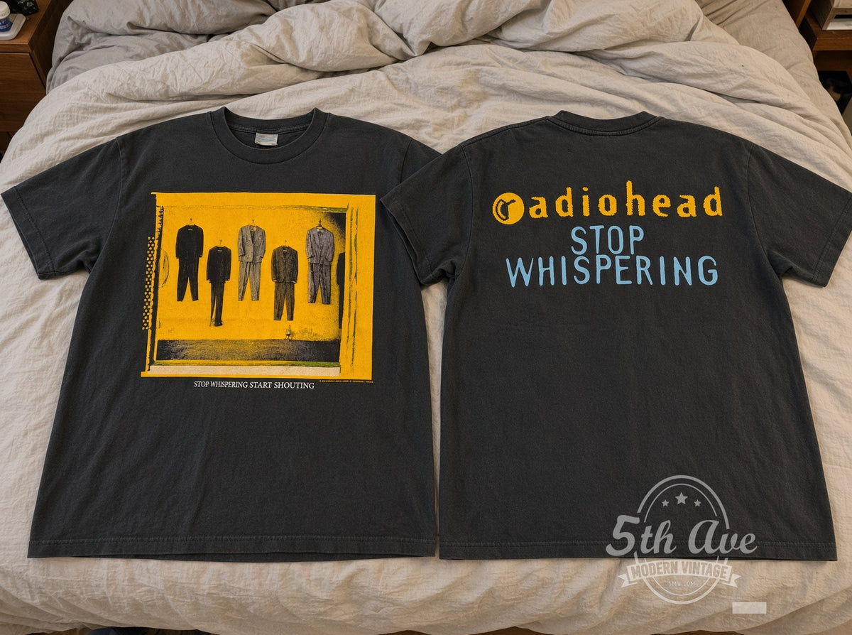 Radiohead – Stop Whispering vintage t-shirt laid on bed