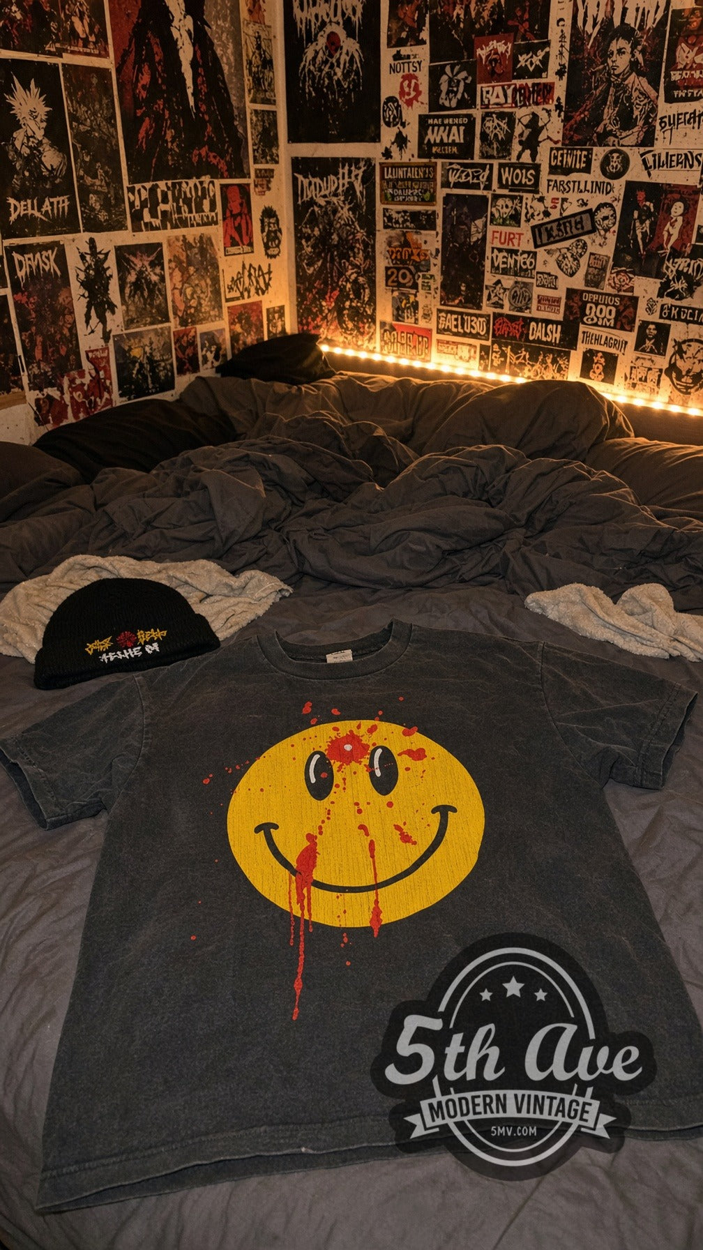 Smiley Face Bullet Hole vintage graphic tee laid flat
