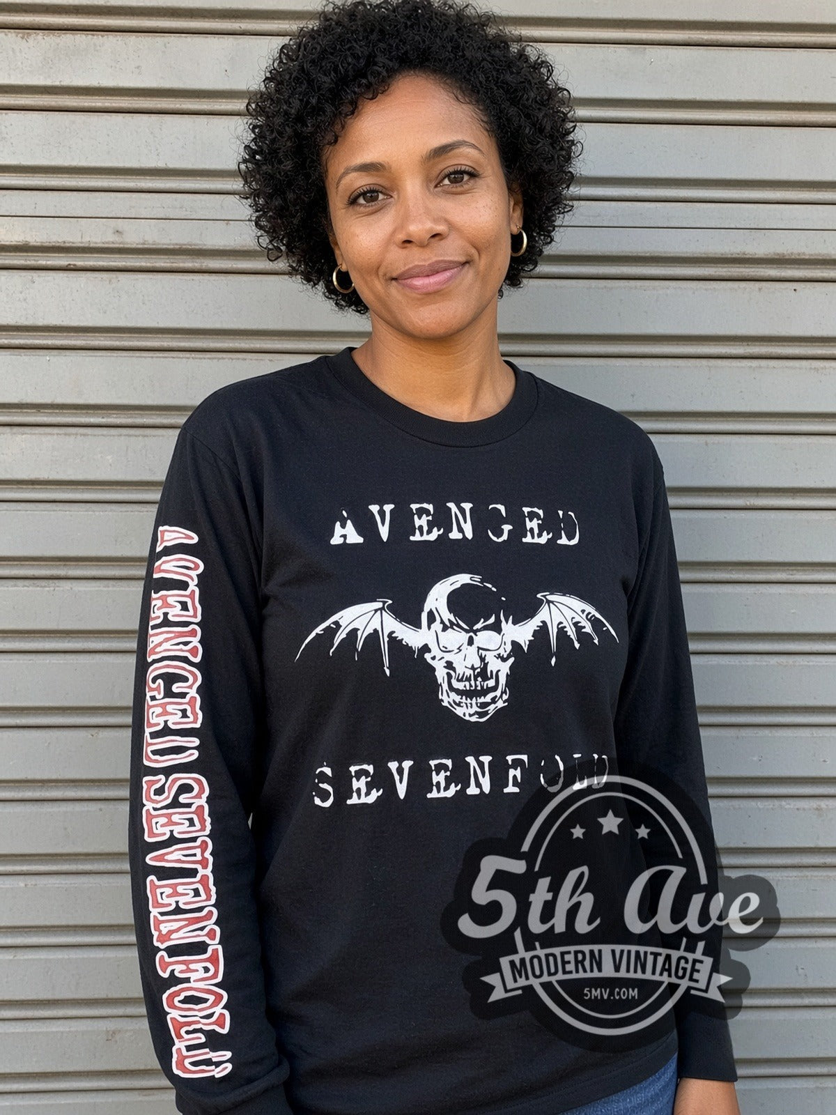 Model wearing the Avenged Sevenfold Deathbat Logo vintage band long sleeve t-shirt