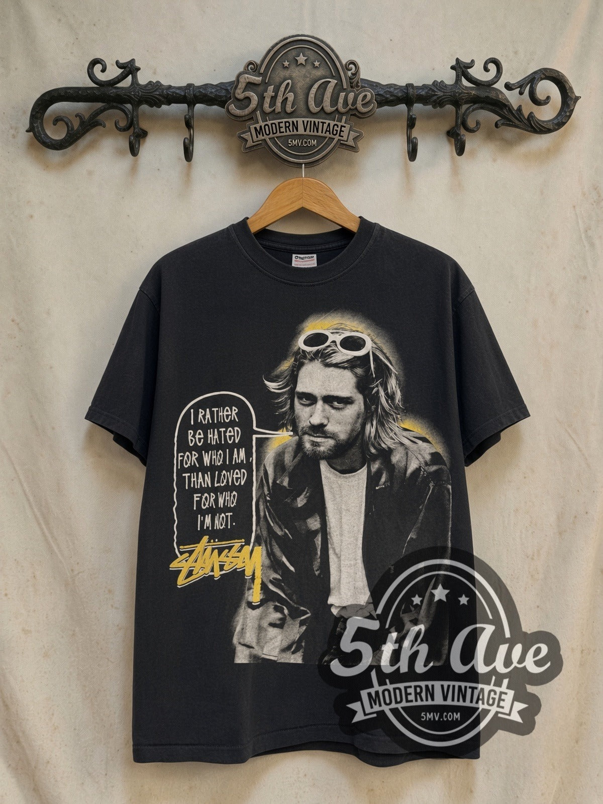 Kurt Cobain Stussy Halo Quote vintage band t-shirt, front view on a display rack
