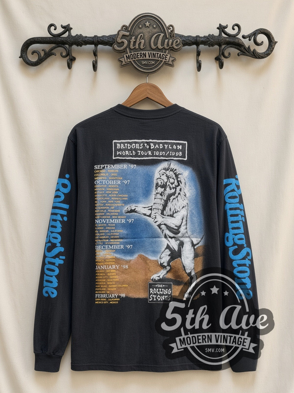 The Rolling Stones Bridges to Babylon Lion vintage band long sleeve t-shirt, back view on a display rack