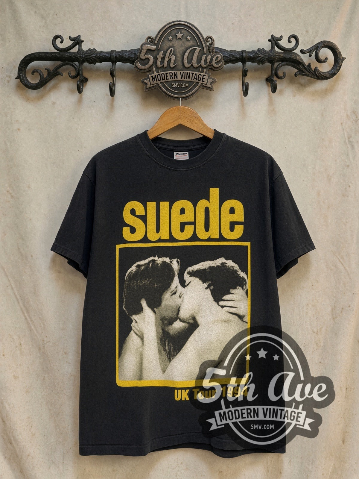 Suede UK Tour 1994 Kiss Photo vintage band t-shirt, front view on a display rack