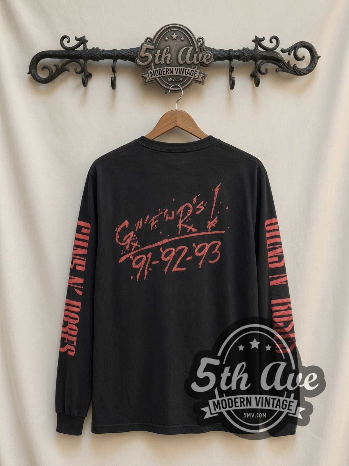 Guns N' Roses Skull Crossed Guns Flag vintage band long sleeve t-shirt, back view on a display rack