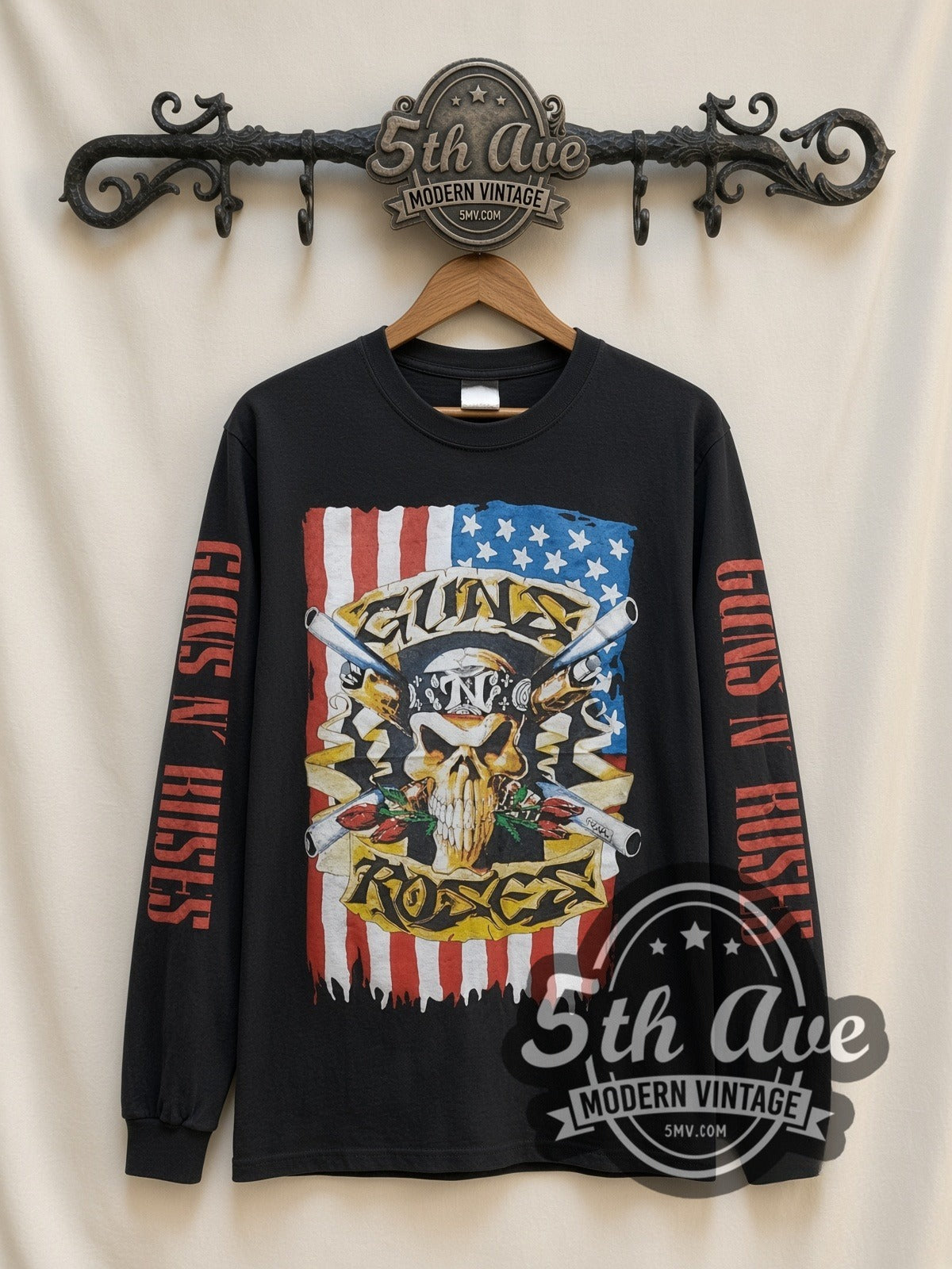 Guns N' Roses Skull Crossed Guns Flag vintage band long sleeve t-shirt, front view on a display rack