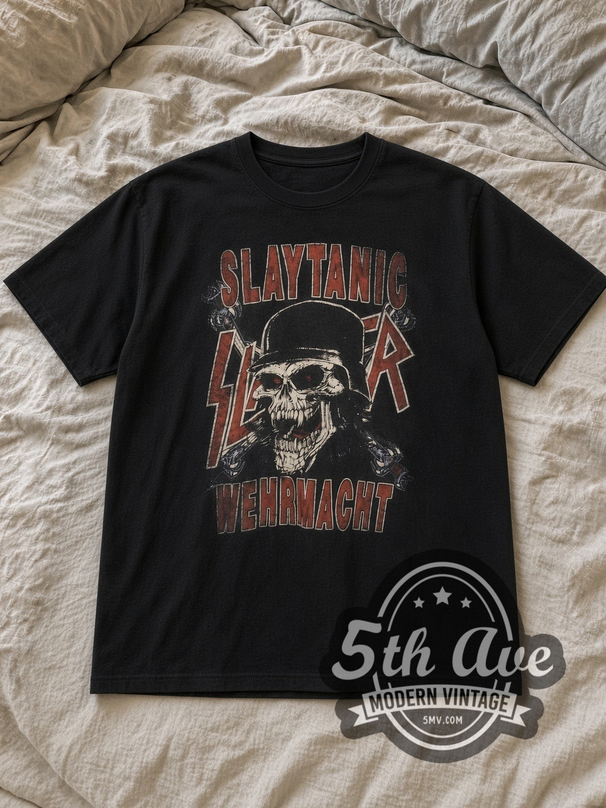 Black Slayer Slaytanic Wehrmacht Helmet Skull Vintage Band T-Shirt laid flat on a linen bed
