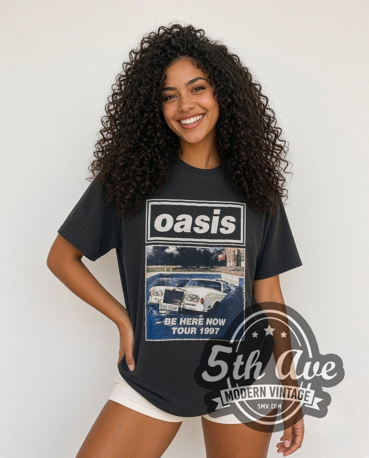Model wearing the Oasis Be Here Now' Tour 1997 vintage band t-shirt in black