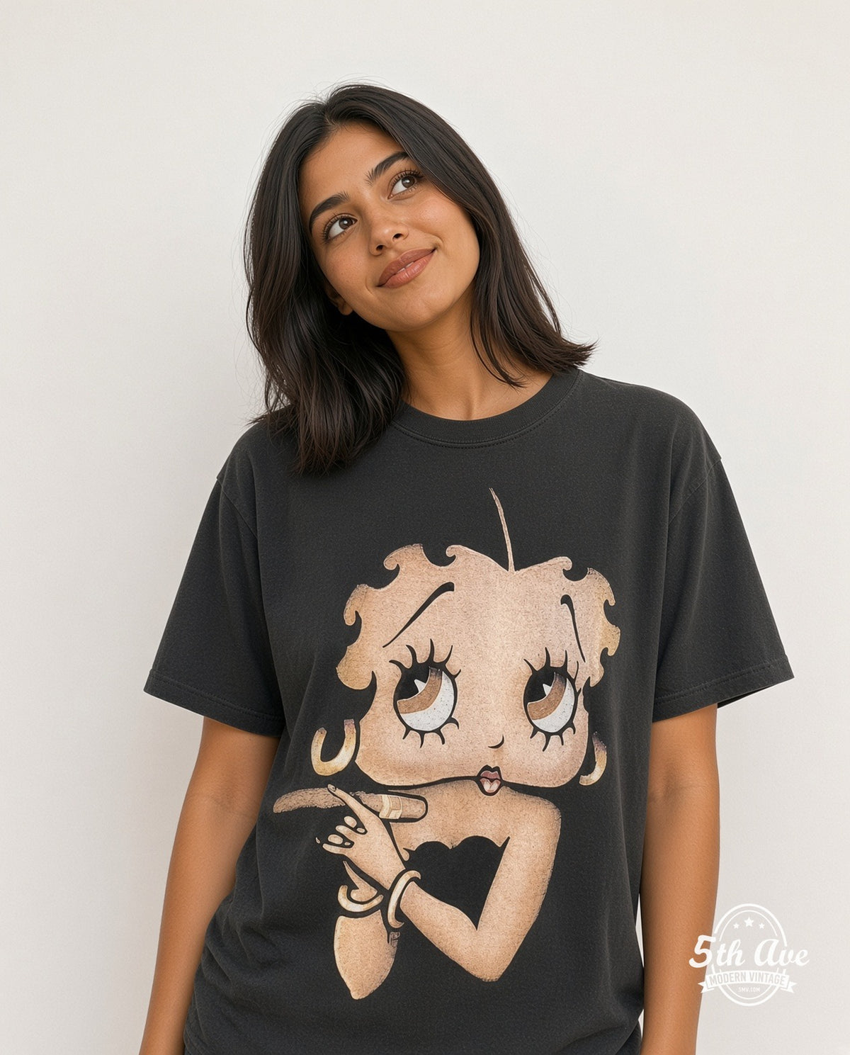 Model wearing the Betty Boop Hollyboop graphic tee in black