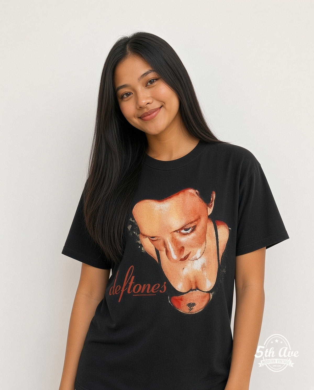 Model wearing the Deftones Around the Fur Red Script vintage band t-shirt in black