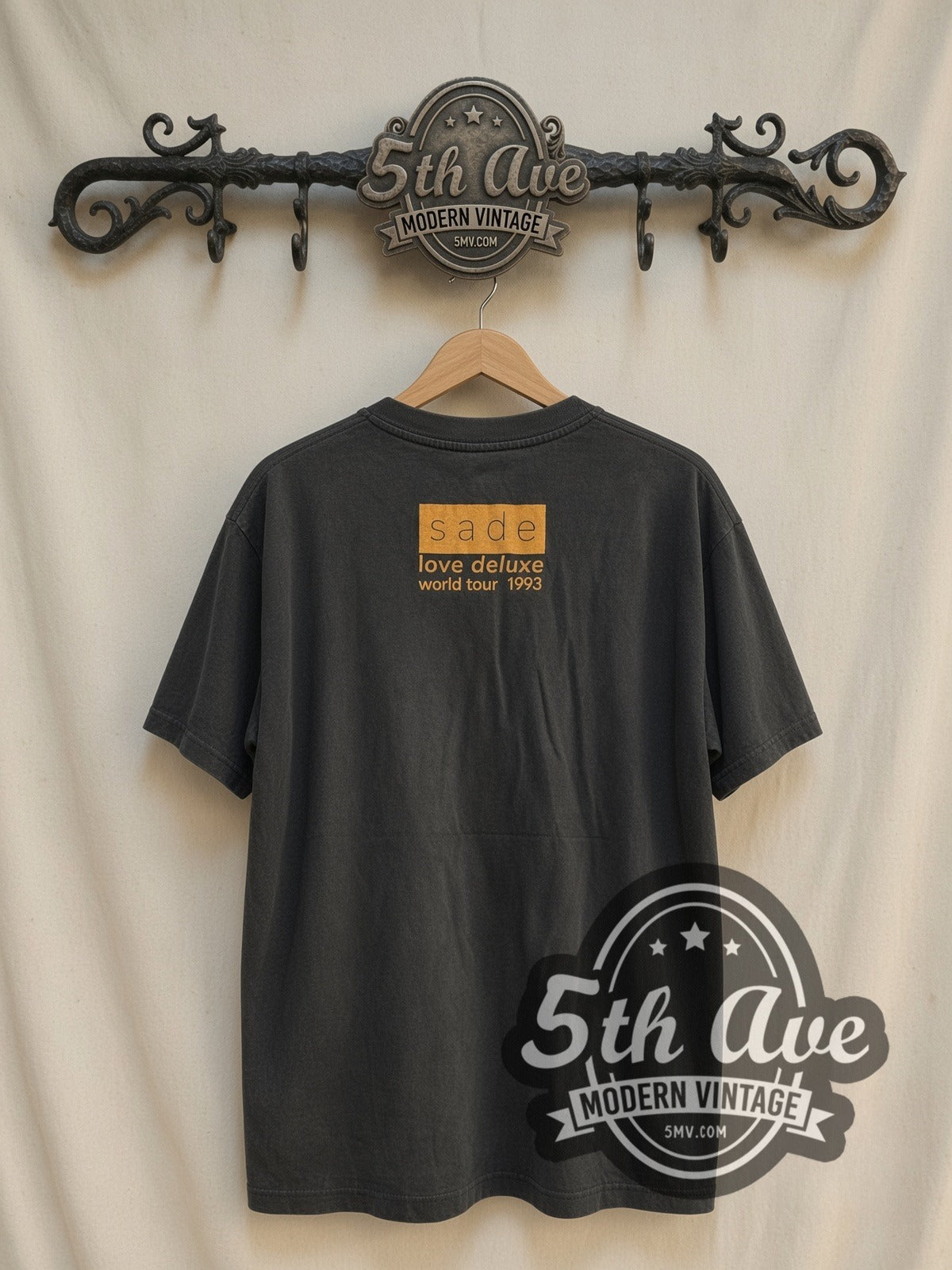 Sade Love Deluxe World Tour 1993 Ray Halo vintage band t-shirt, back view on a display rack