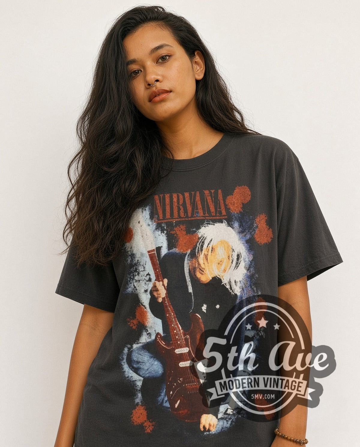 Model wearing the Nirvana Kurt Cobain Red Guitar vintage band t-shirt