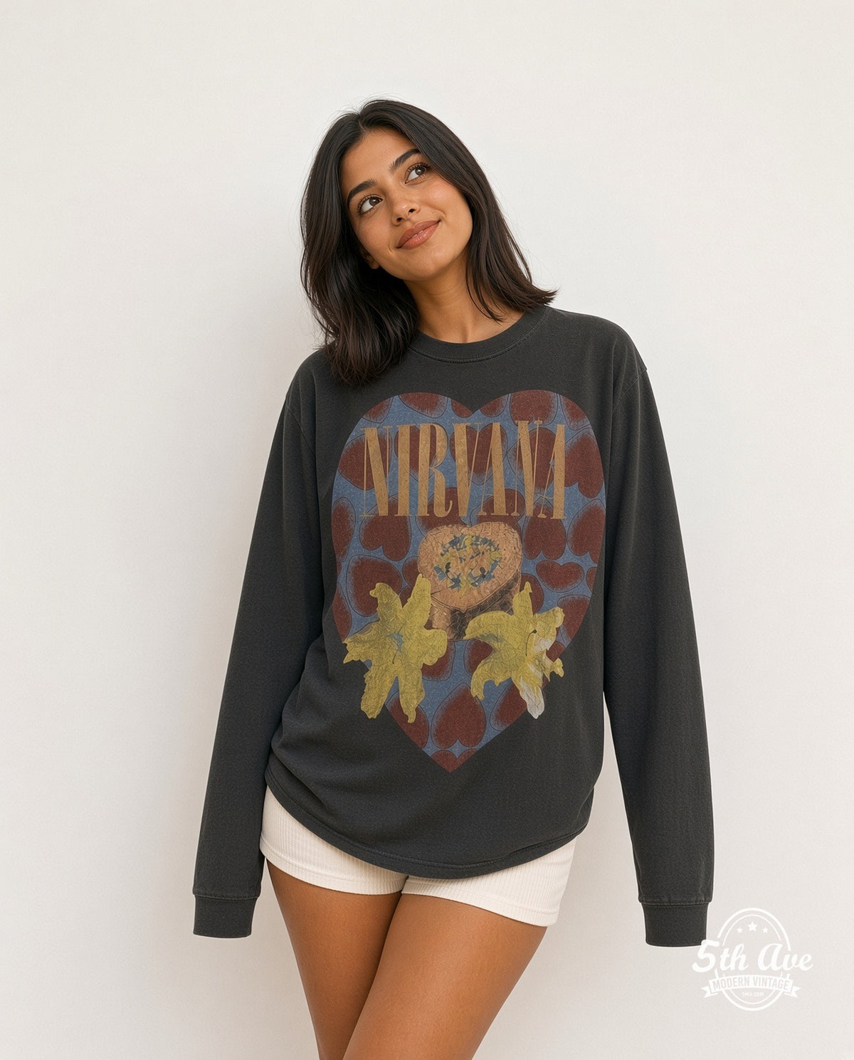 Model wearing the Nirvana Heart-Shaped Box long sleeve vintage band t-shirt