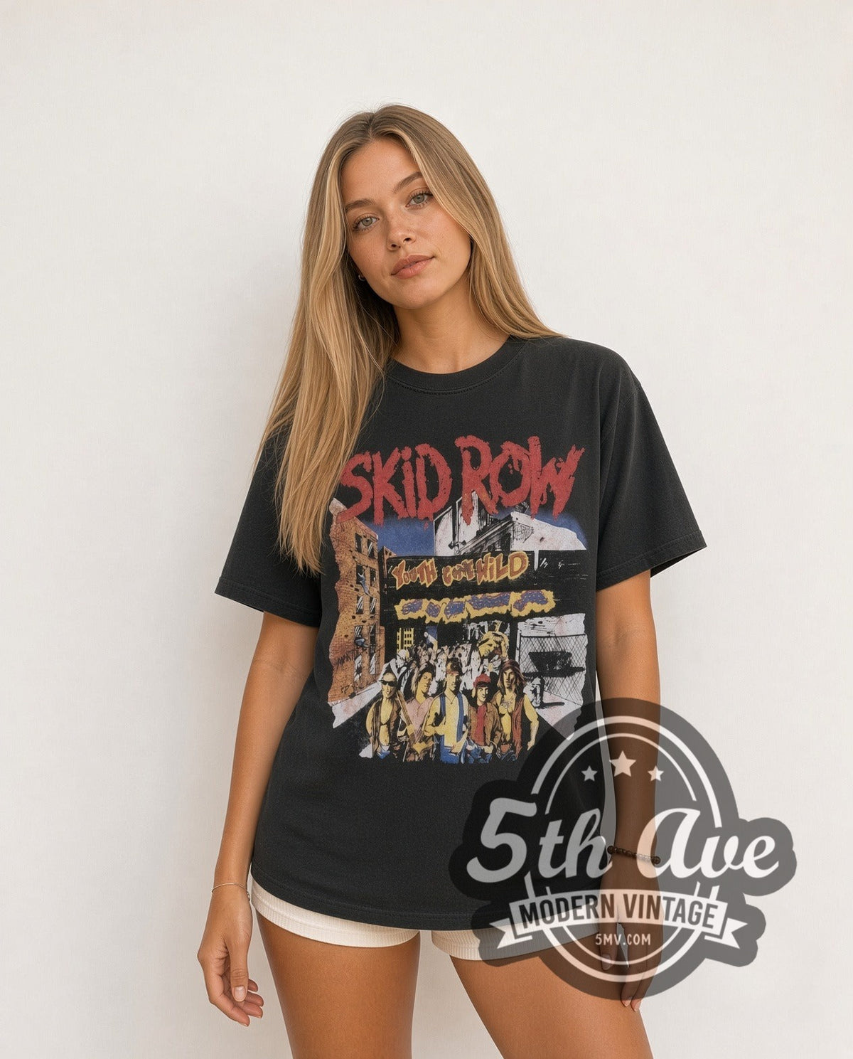 Model wearing the Skid Row Youth Gone Wild vintage band t-shirt in black