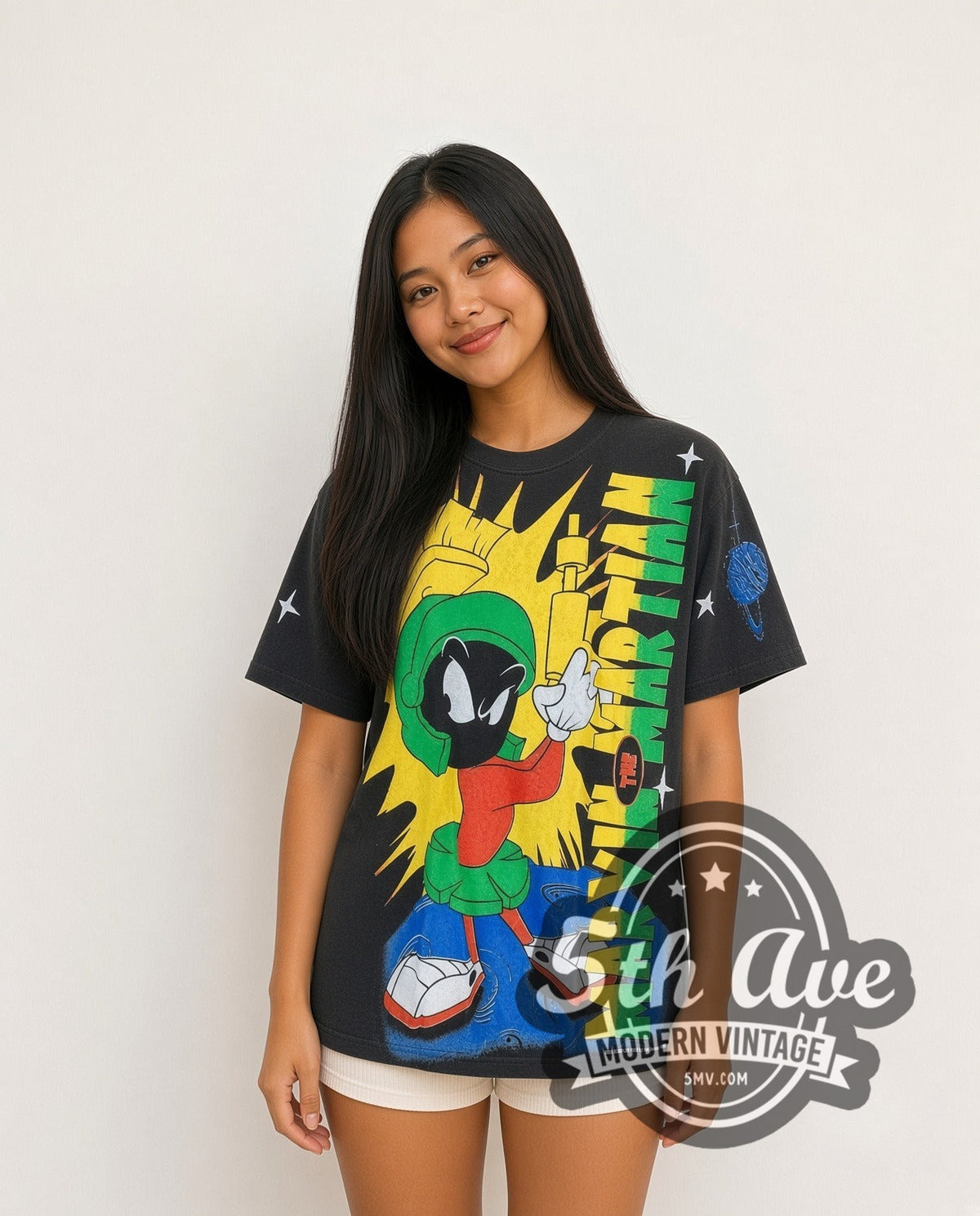Model wearing the Looney Tunes Marvin the Martian all-over-print graphic tee