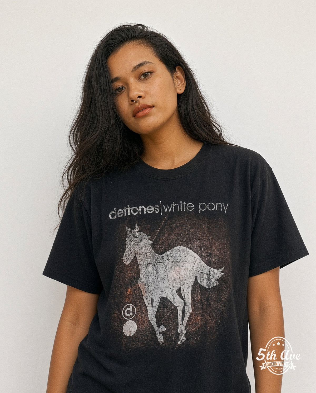 Model wearing the Deftones White Pony vintage band t-shirt in white