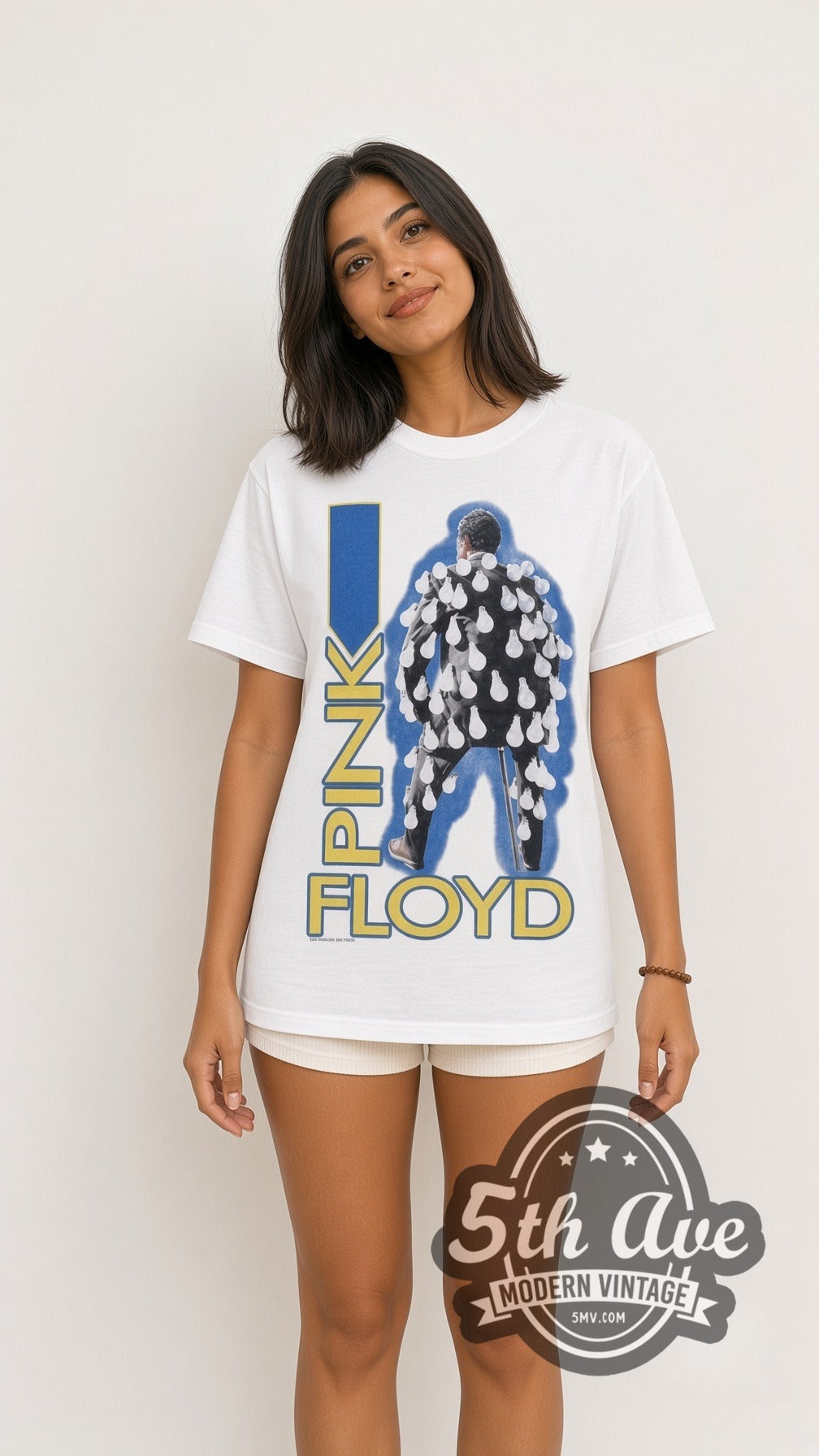 Model wearing the Pink Floyd Figure vintage band t-shirt in white