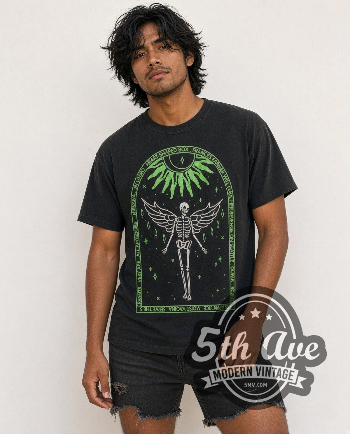 Model wearing the Nirvana In Utero Tracklist Winged Skeleton vintage band t-shirt