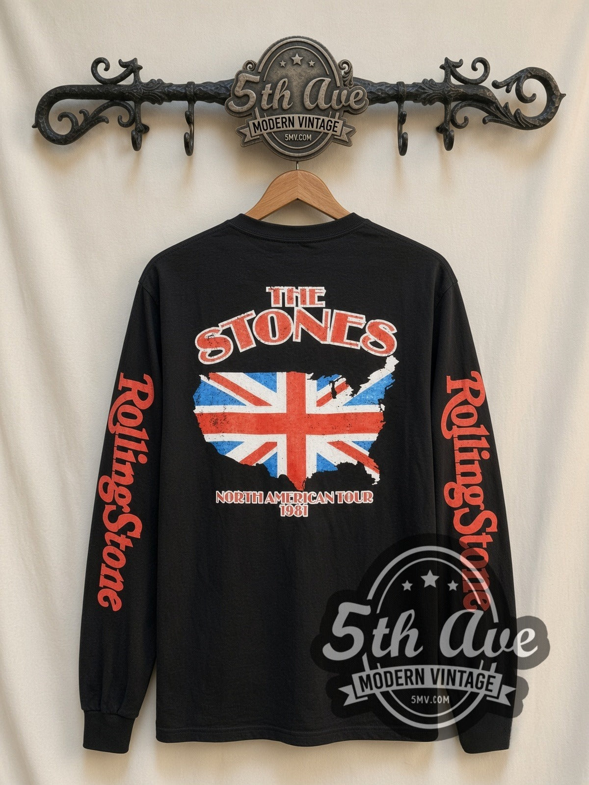 The Rolling Stones US Flag Tongue vintage band long sleeve t-shirt, back view on a display rack
