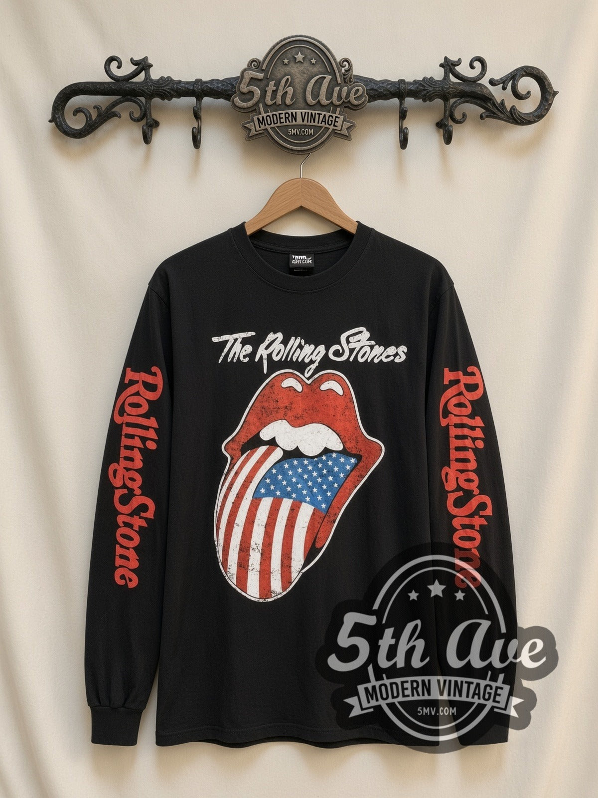 The Rolling Stones US Flag Tongue vintage band long sleeve t-shirt, front view on a display rack