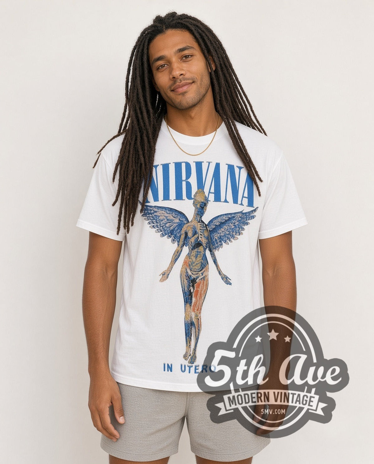 Model wearing the Nirvana In Utero Blue Logo Angel White vintage band t-shirt in white