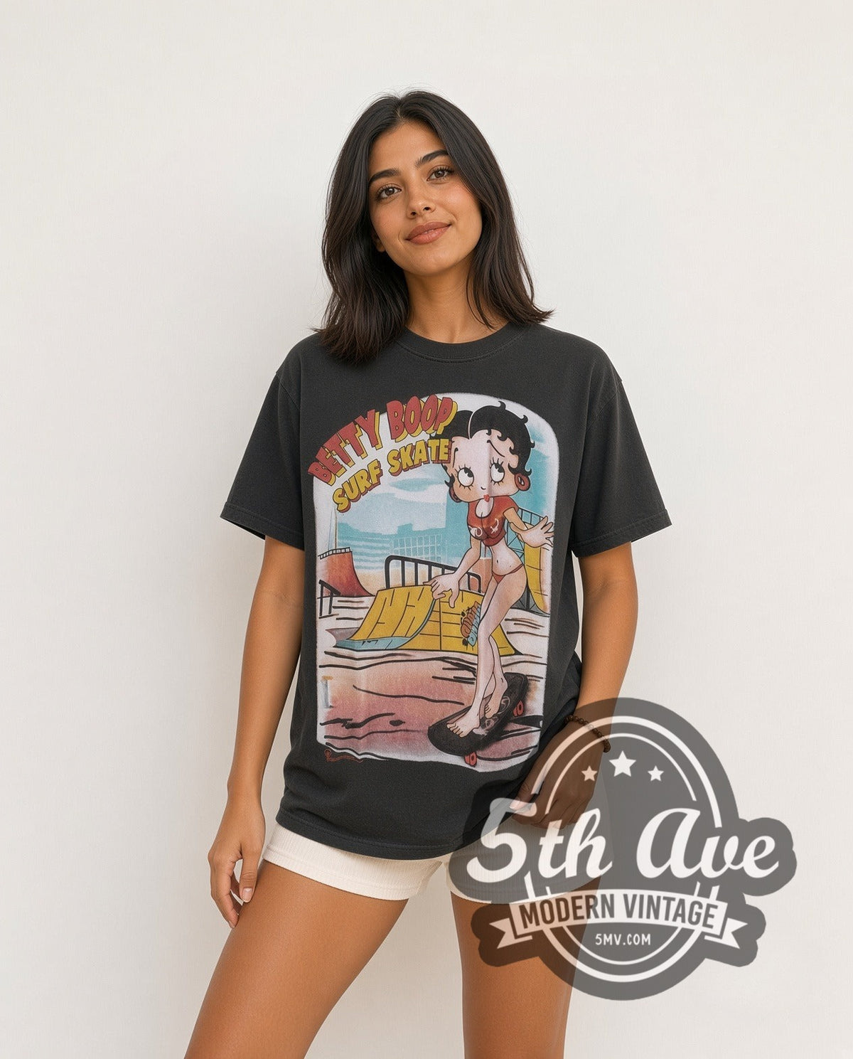 Model wearing the Betty Boop I'm Good at Surf Skate vintage cartoon tee