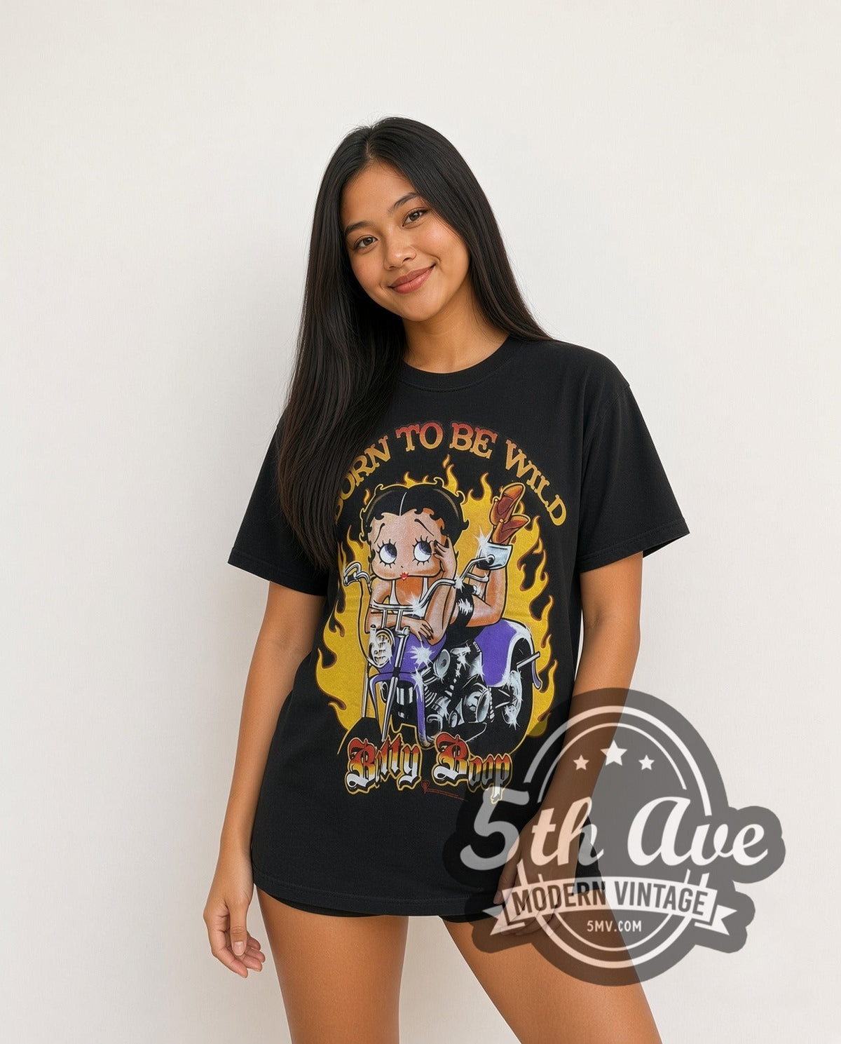 Model wearing the Betty Boop Born to Be Wild Biker vintage cartoon tee