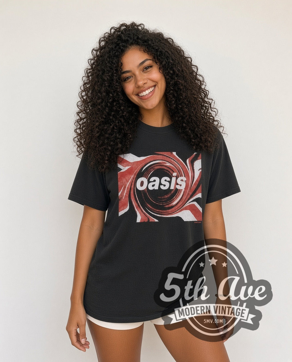 Model wearing the Oasis Swirl Logo vintage band t-shirt in black