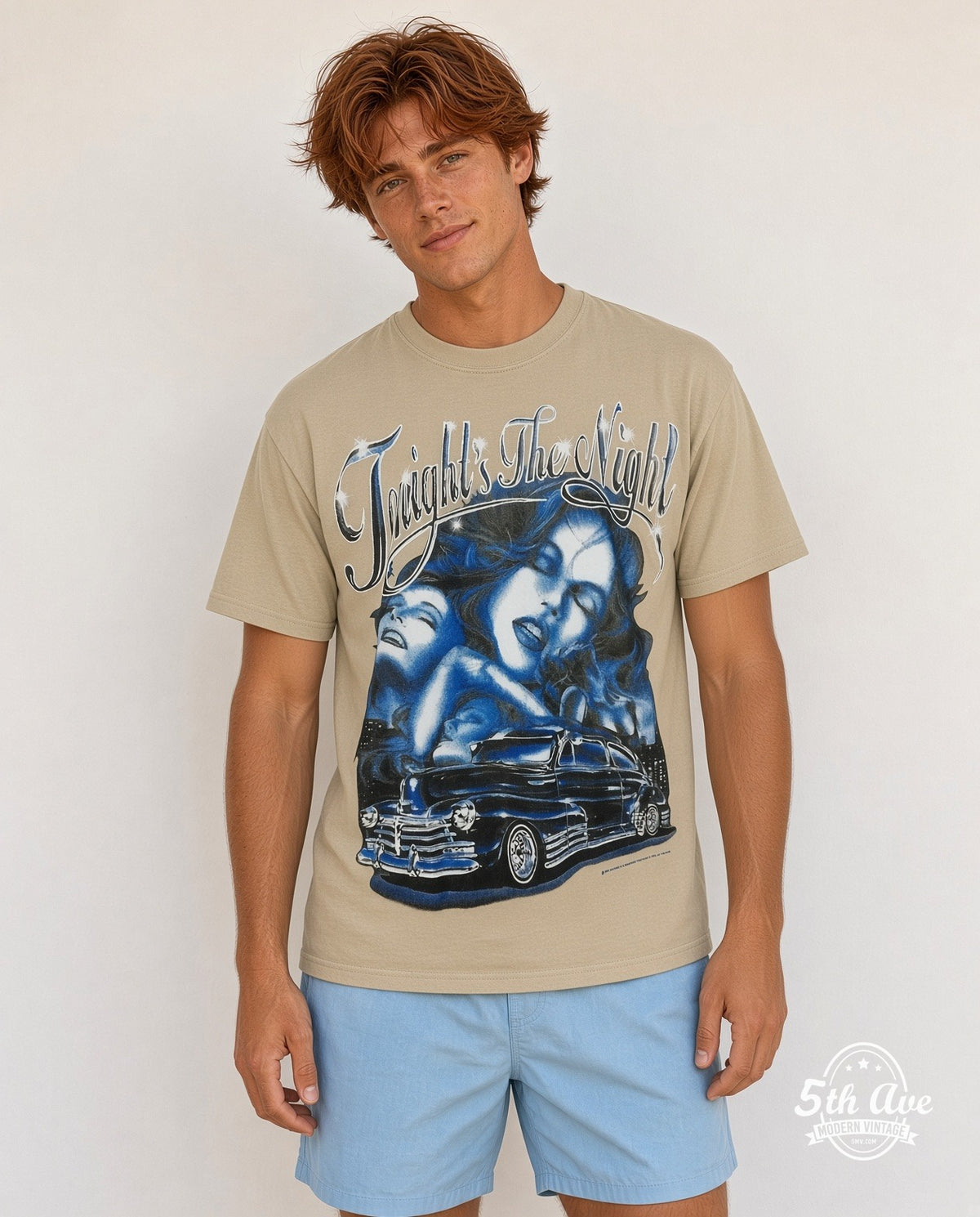 Model wearing the Rollin Hard Tonight's the Night Lowrider graphic tee in sand