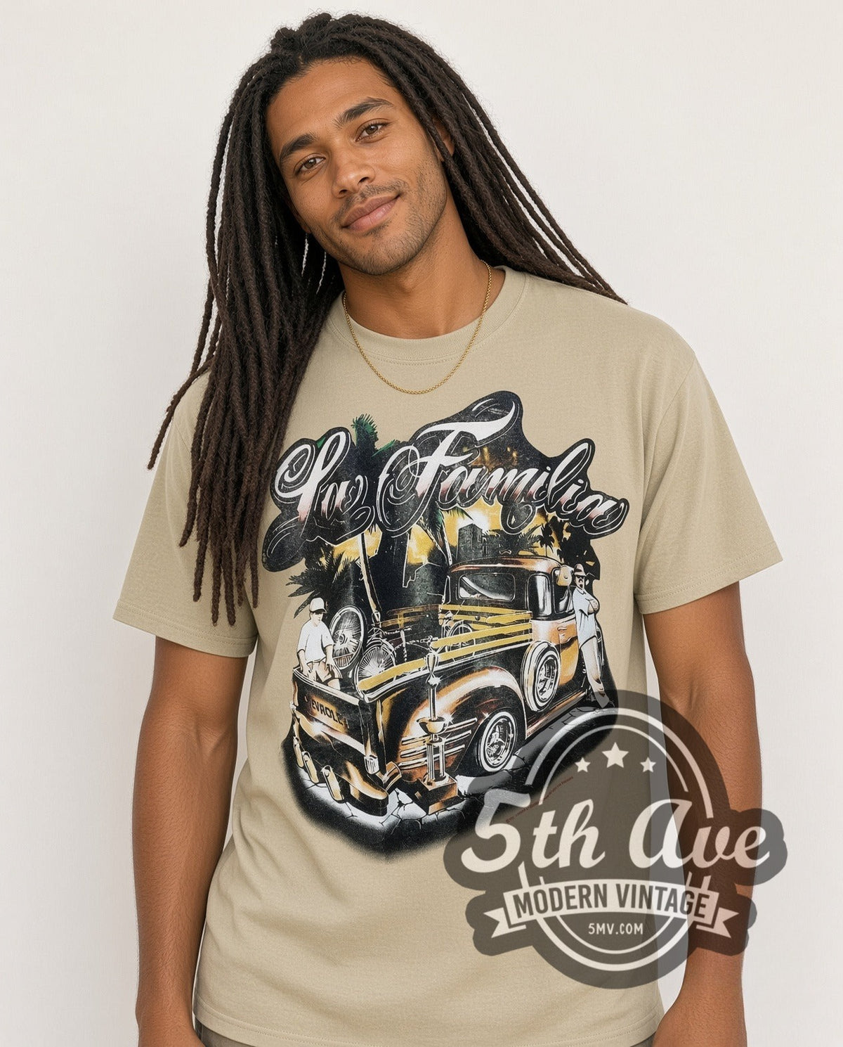Model wearing the Rollin Hard For Familia Lowrider vintage graphic tee in sand