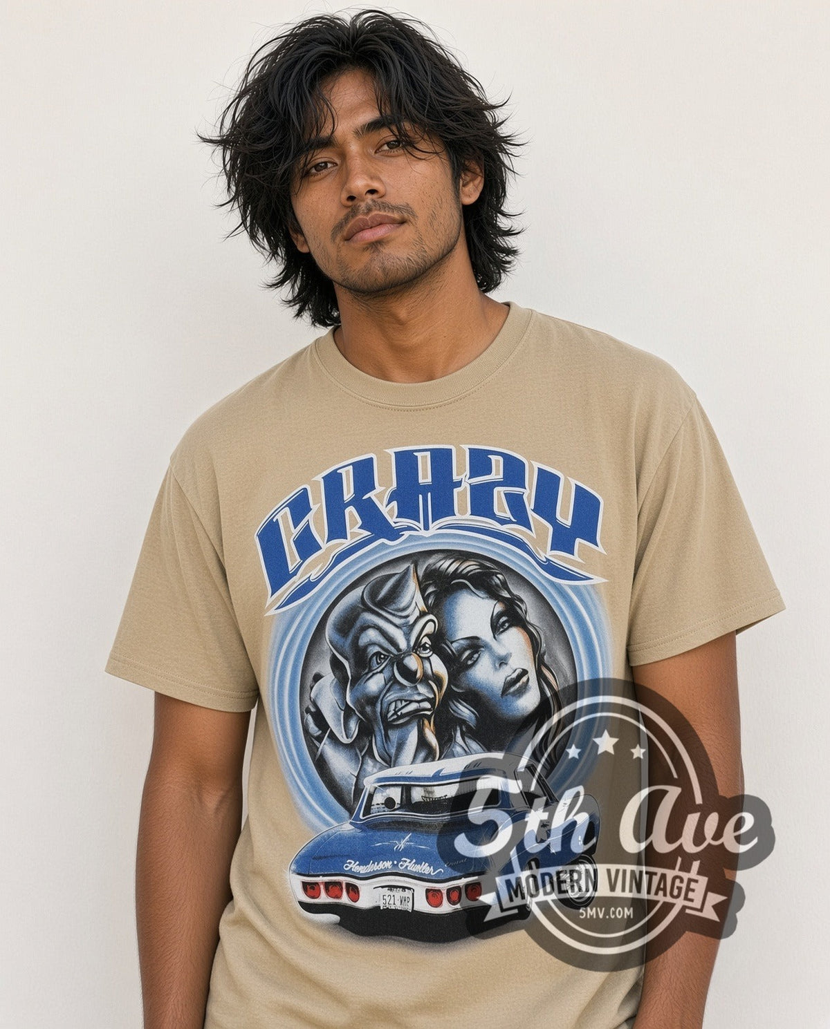 Model wearing the Rollin Hard Crazy Lowrider vintage graphic tee in sand