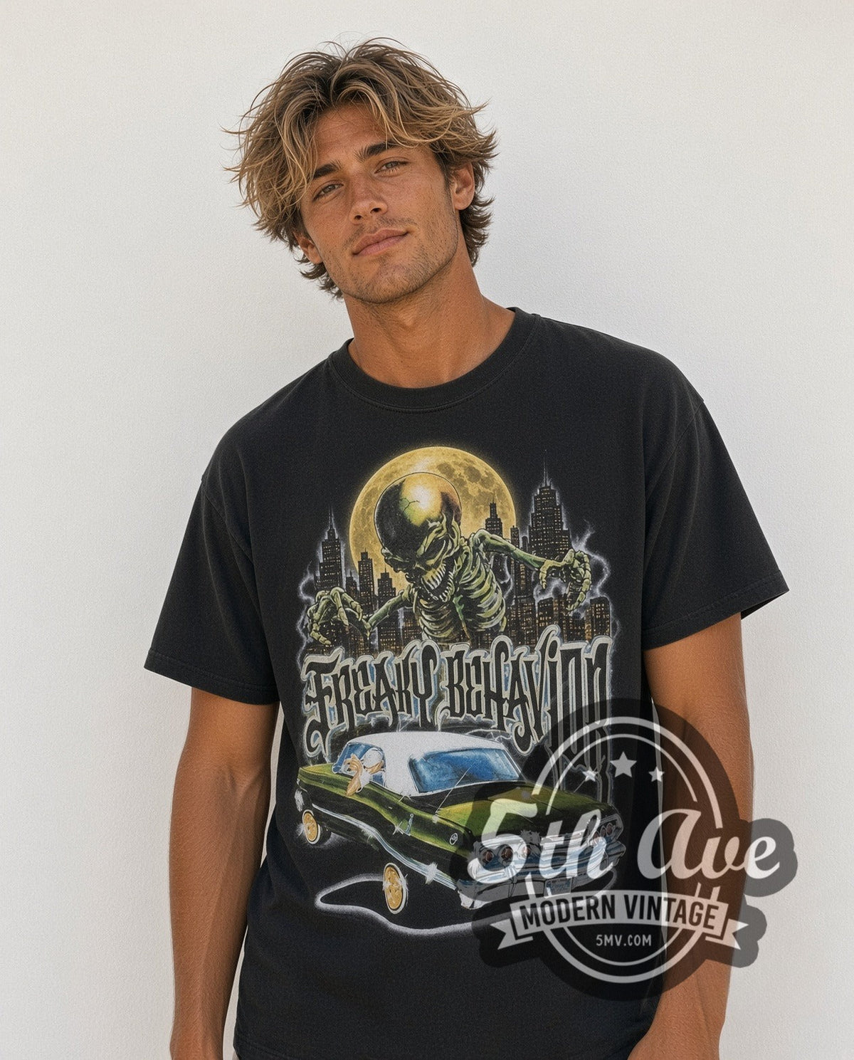 Model wearing the Rollin Hard Freaky Behavior Lowrider vintage graphic tee