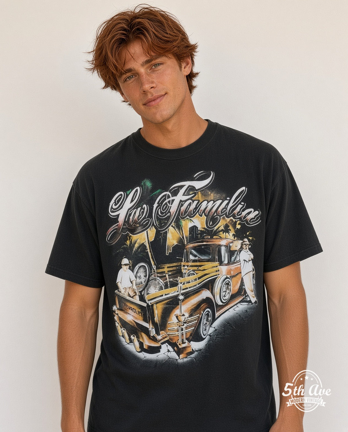 Model wearing the Rollin Hard For Familia Lowrider graphic tee