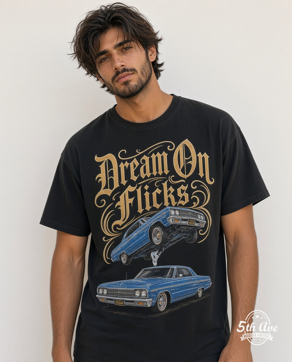 Model wearing the Rollin Hard Lowrider Dreams and Hydraulic Scenes graphic tee