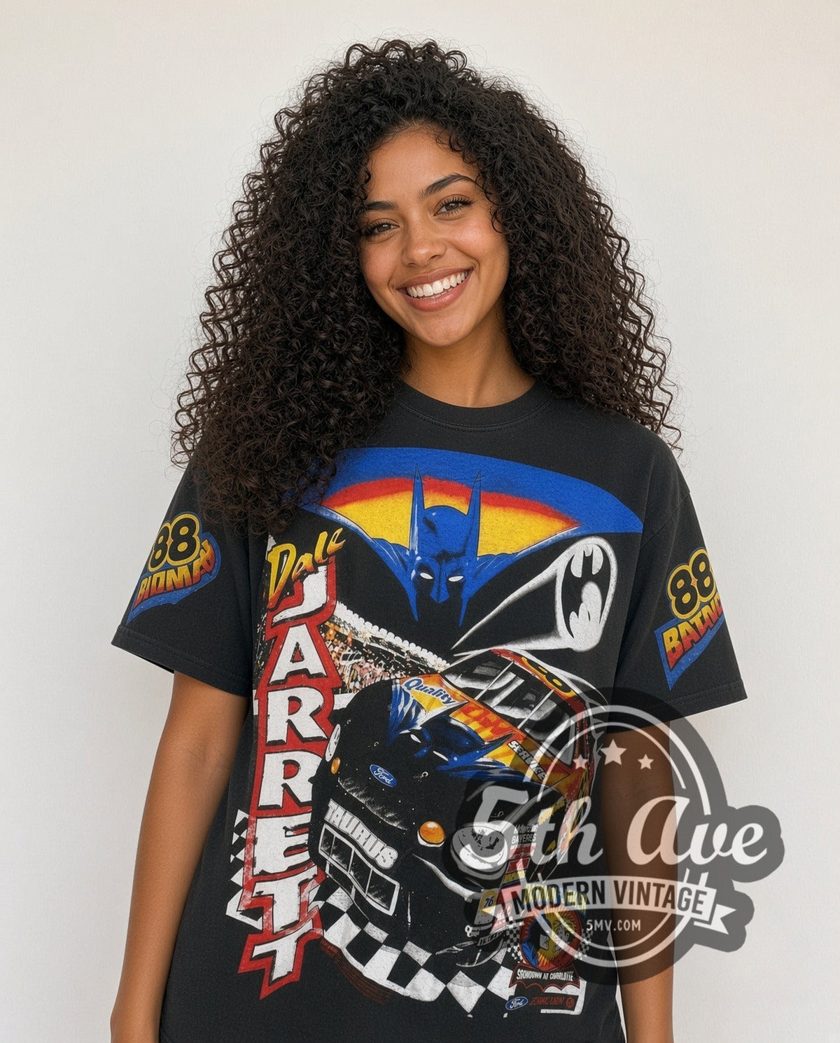 Model wearing the NASCAR / Dale Jarrett Batman Ford Taurus all-over-print vintage NASCAR tee in black