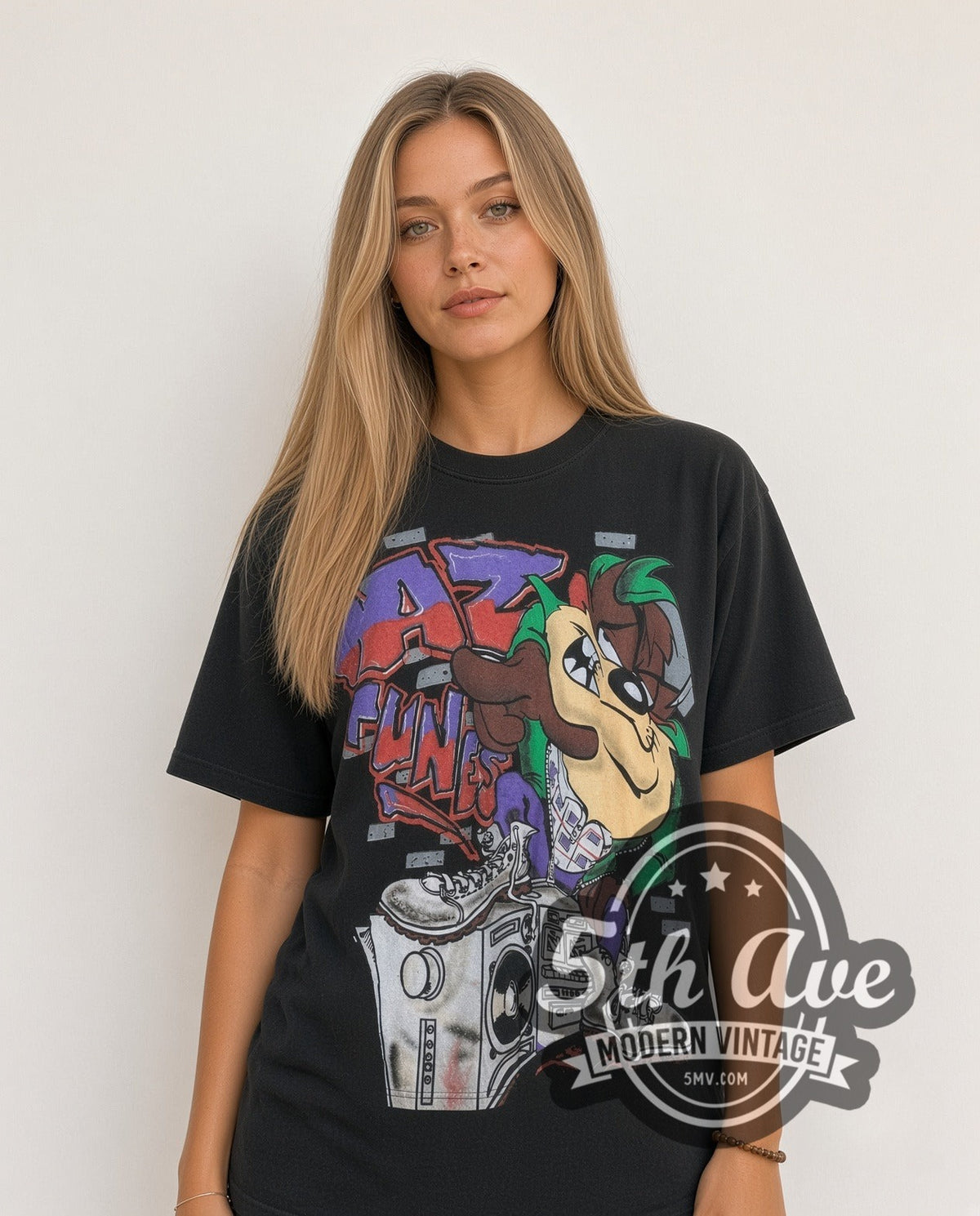 Model wearing the Looney Tunes Taz-Mania Wild Style all-over-print vintage cartoon tee
