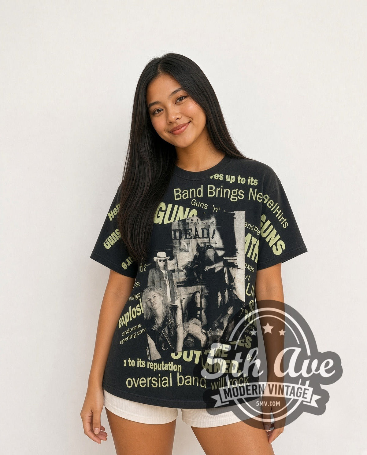 Model wearing the Guns N' Roses DEAD Newspaper Headlines all-over-print vintage band t-shirt in black