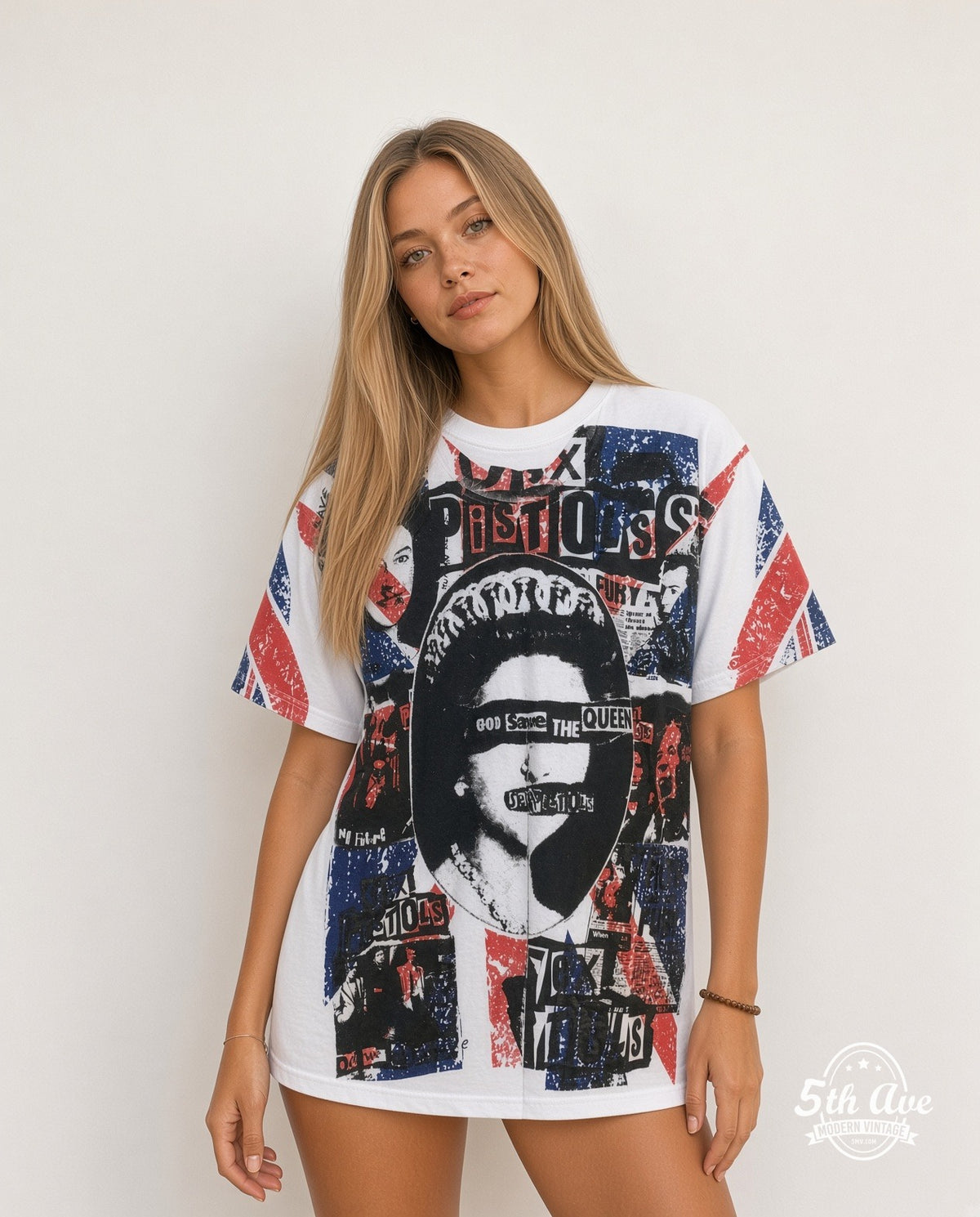 Model wearing the Sex Pistols God Save the Queen all-over-print vintage band t-shirt