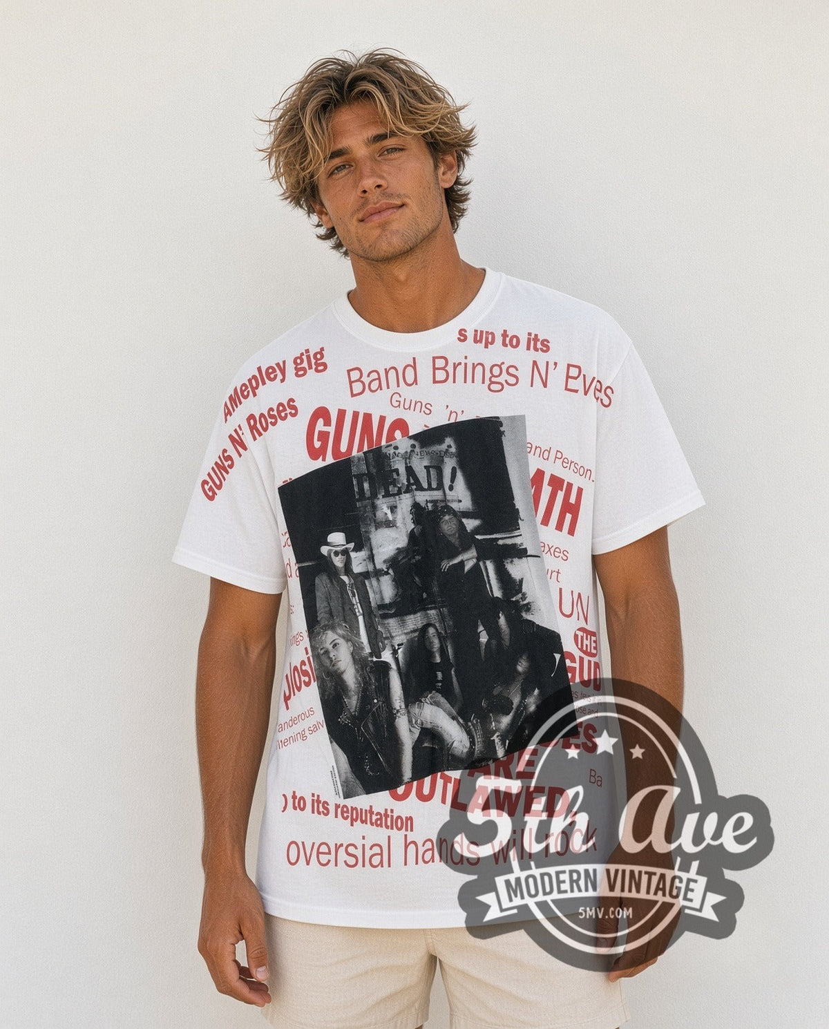 Model wearing the Guns N' Roses DEAD Newspaper Headlines all-over-print vintage band t-shirt in white