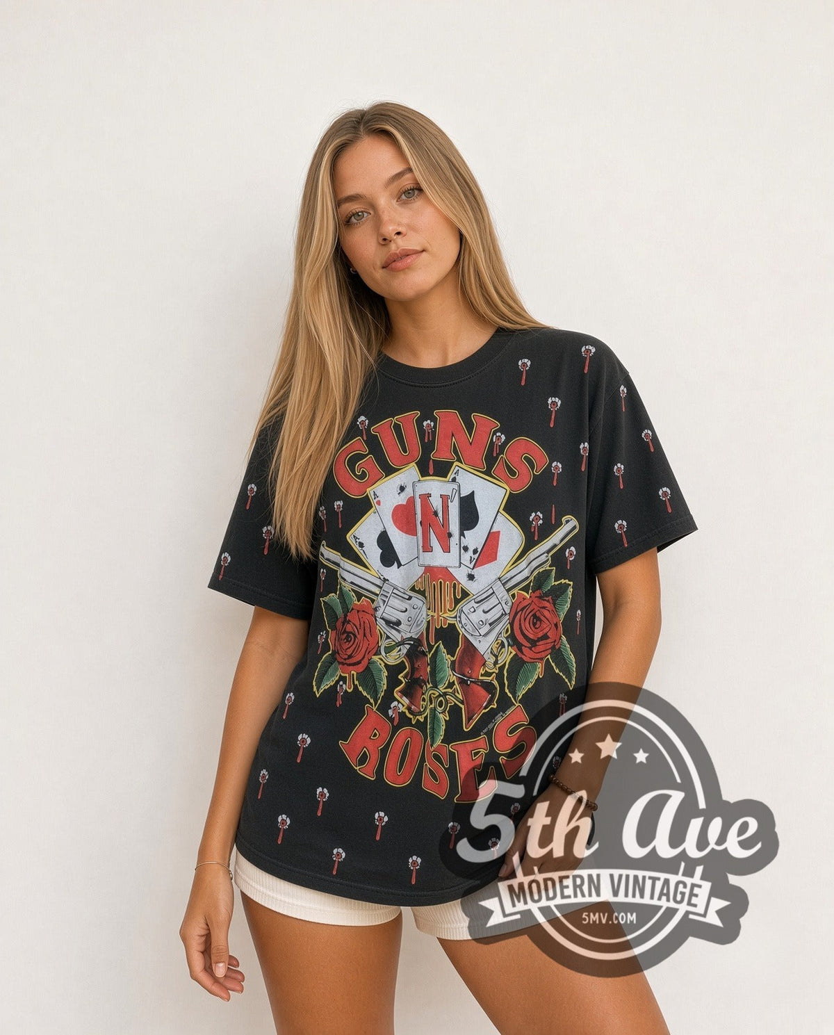 Model wearing the Guns N' Roses Crossed Guns Roses Aces all-over-print vintage band t-shirt