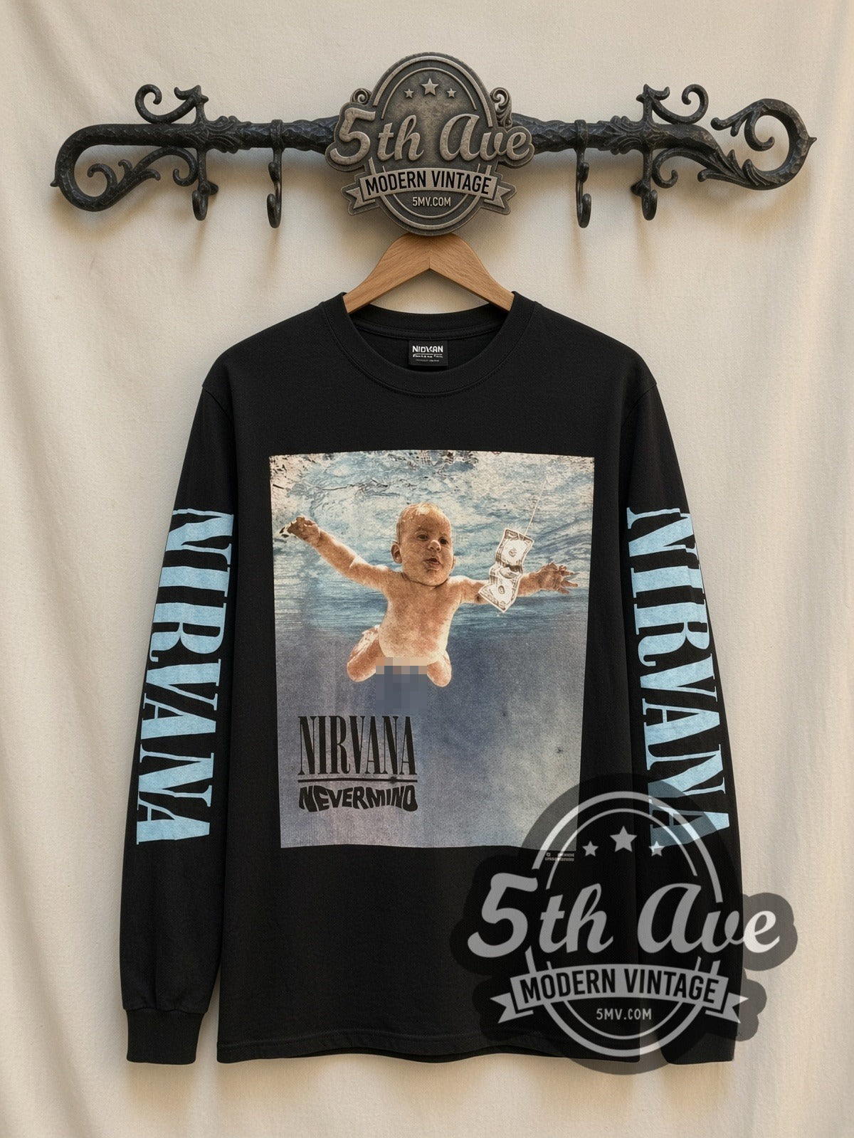 Nirvana Nevermind vintage band long sleeve t-shirt, front view on a display rack