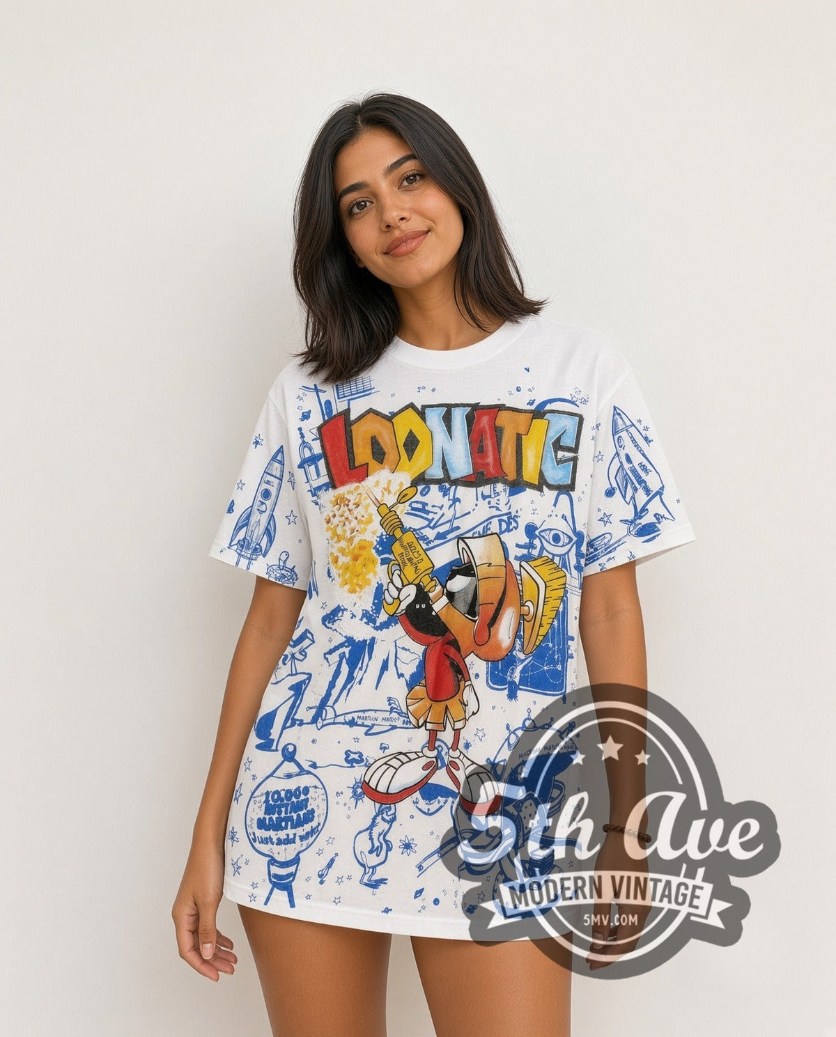 Model wearing the Looney Tunes Marvin the Martian Loonatic Streetwear all-over-print vintage cartoon tee