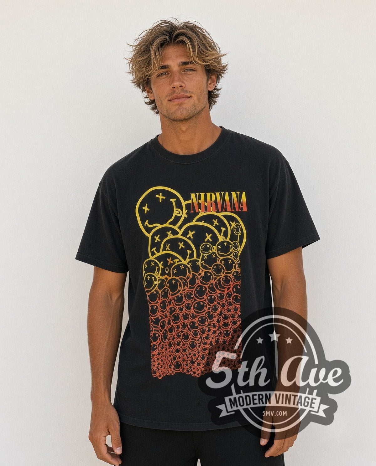 Model wearing the Nirvana Stacked Gradient Smileys Yellow to Red vintage band t-shirt