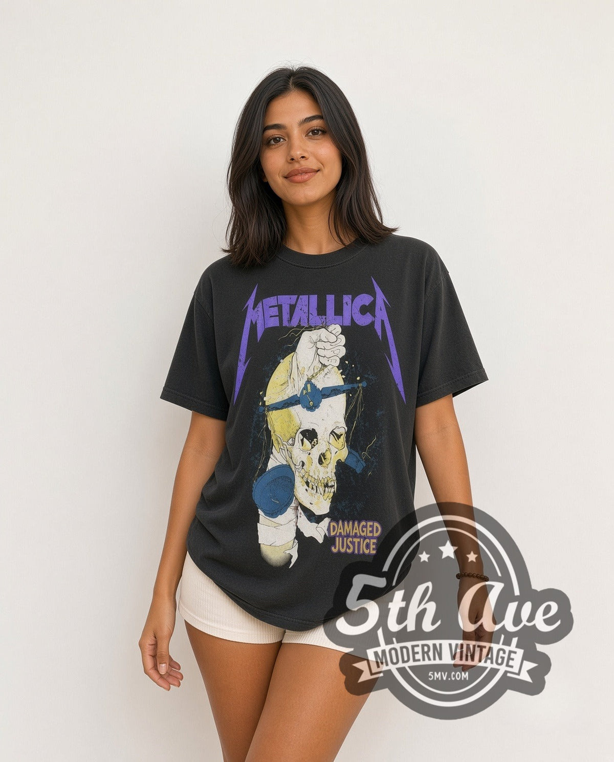 Model wearing the Metallica Damaged Justice Fist Through Skull vintage band t-shirt