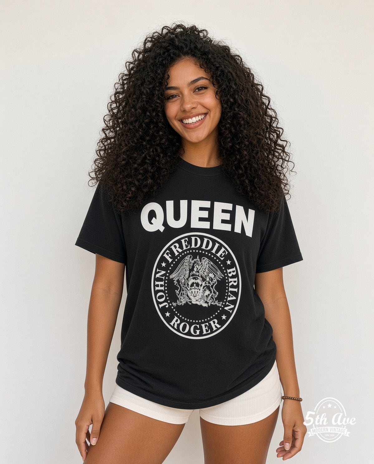 Model wearing the Queen Crest Circle Member Names vintage band t-shirt