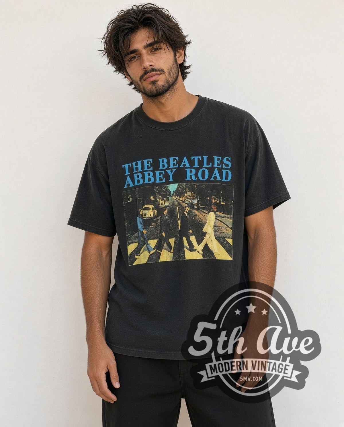 Model wearing The Beatles Abbey Road Crossing Cyan Logo vintage band t-shirt