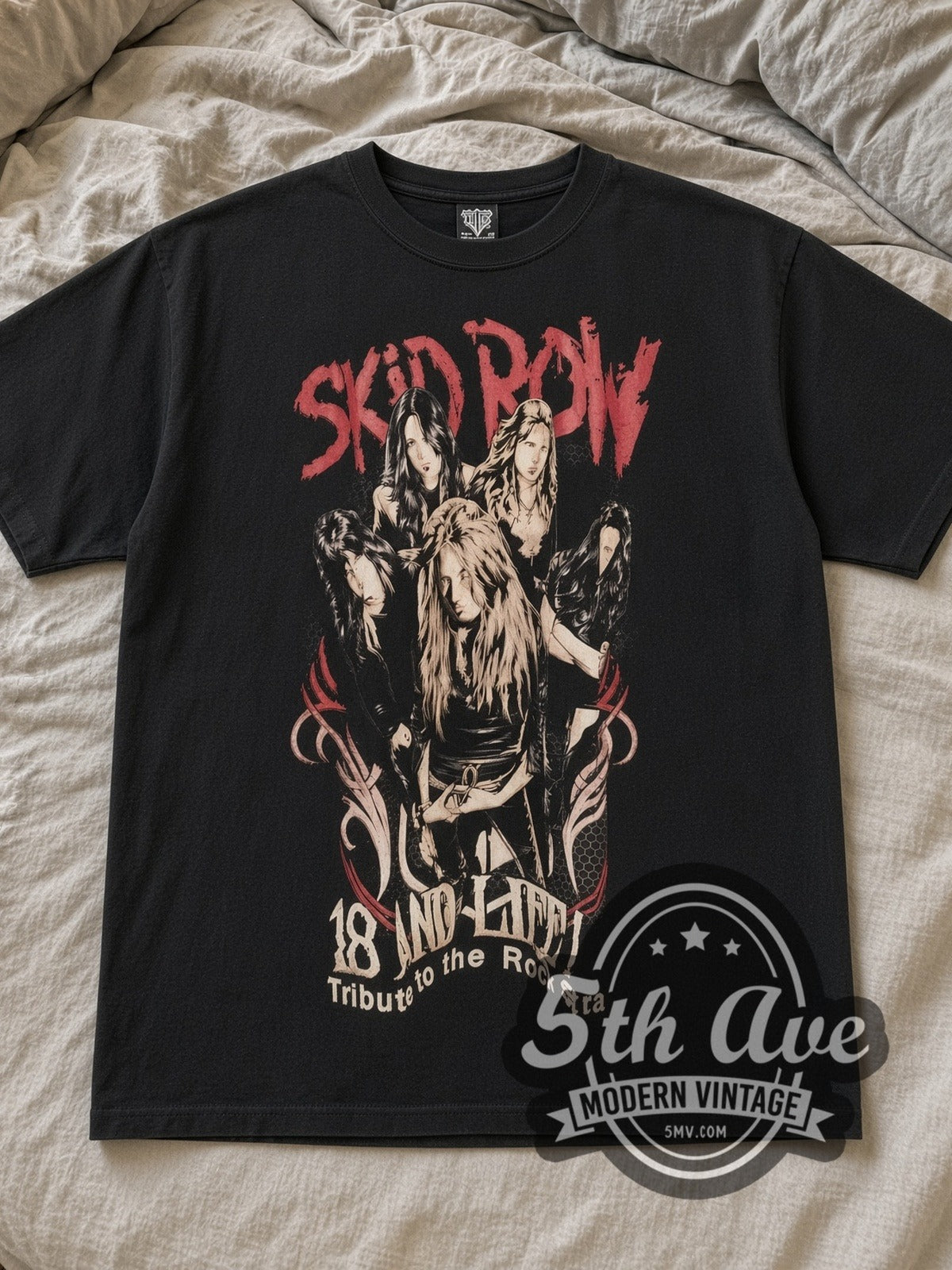 Black Skid Row 18 and Life Vintage Band T-Shirt laid flat on a linen bed