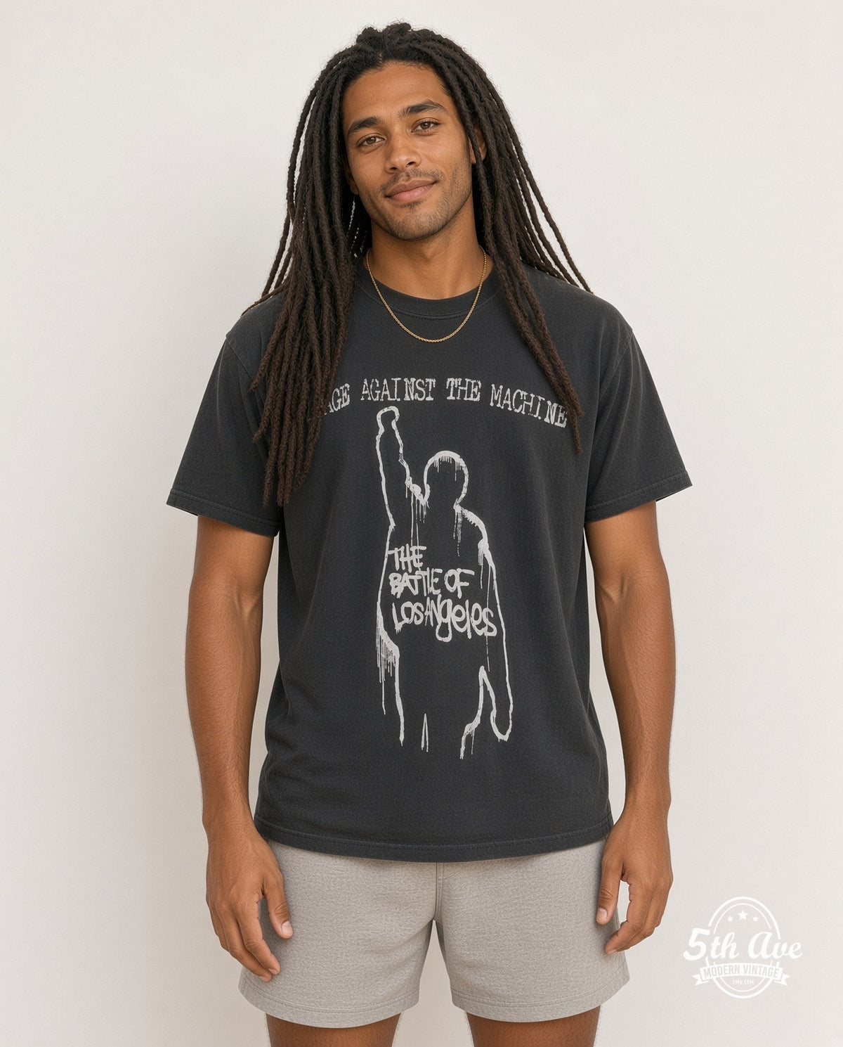 Model wearing the Rage Against the Machine The Battle of Los Angeles White Fist Silhouette vintage band t-shirt in white