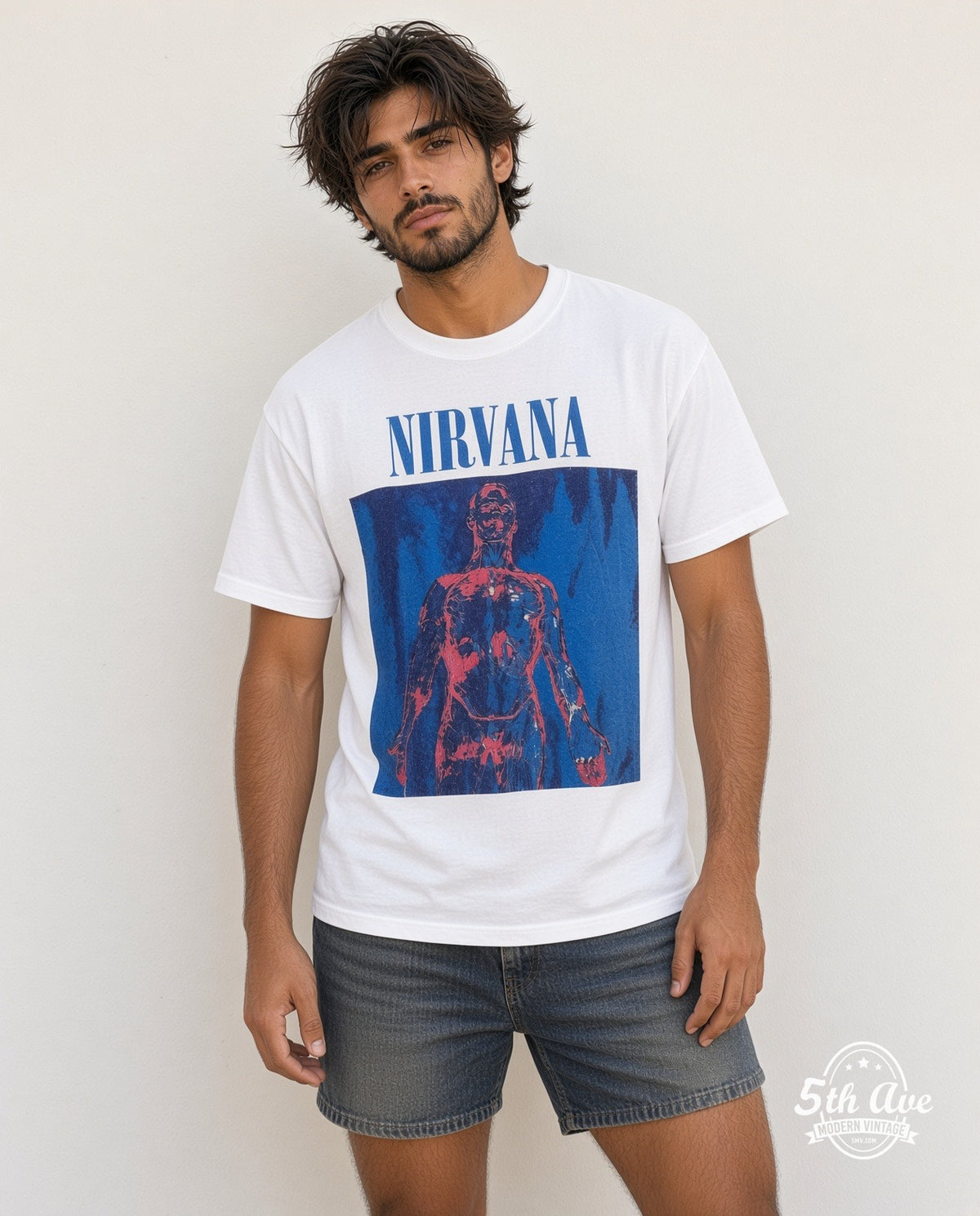 Model wearing the Nirvana Sliver Blue Logo Anatomical Figure vintage band t-shirt in white