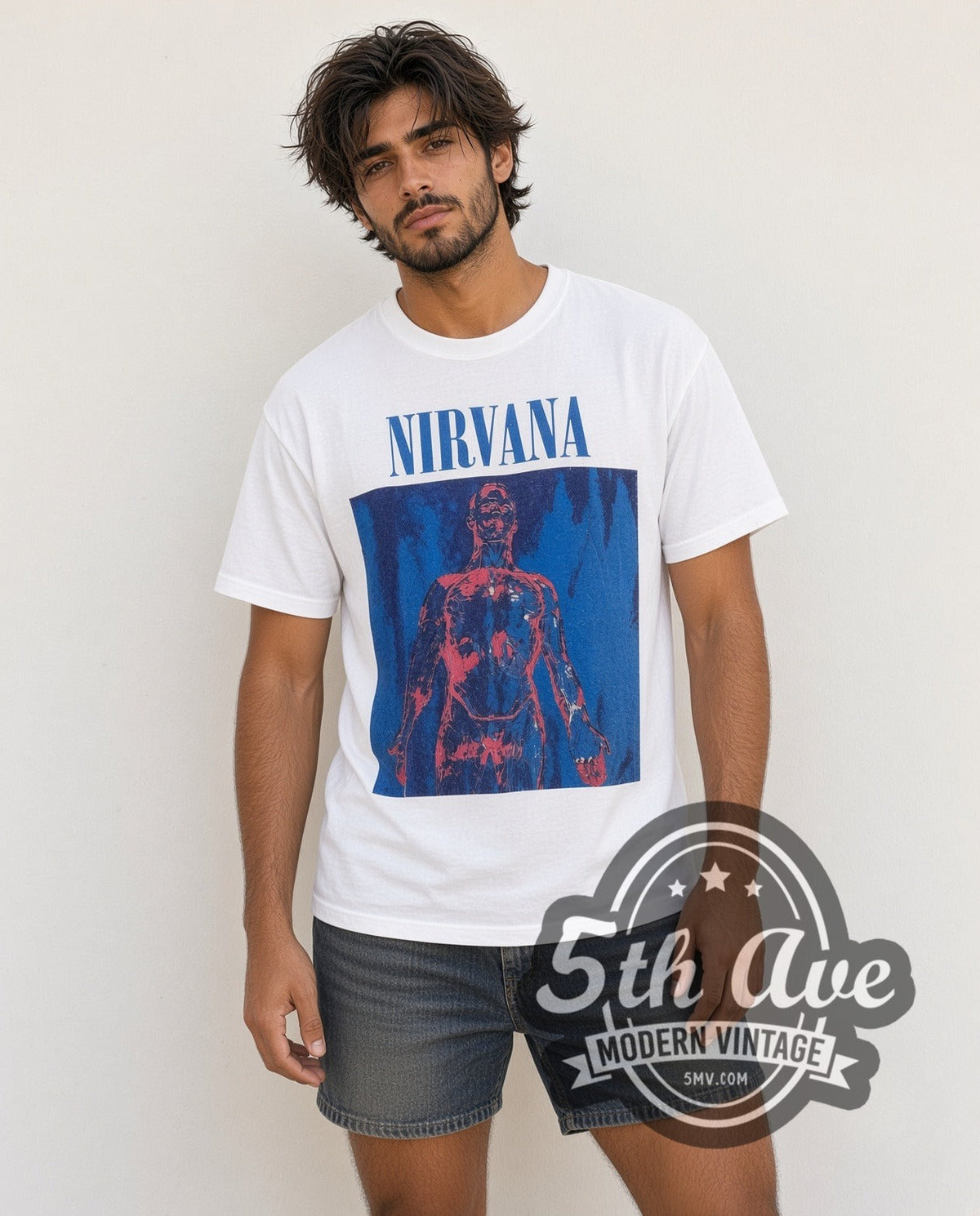 Model wearing the Nirvana Sliver Blue Logo Anatomical Figure vintage band t-shirt in white