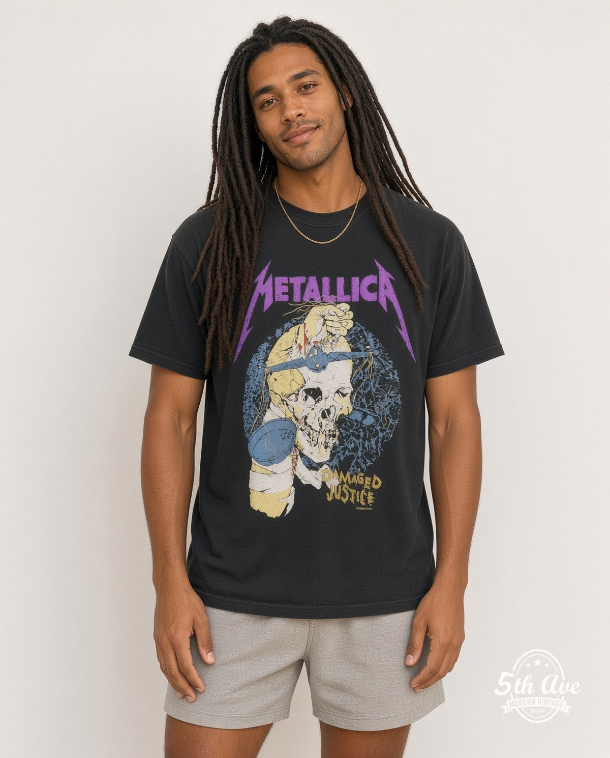 Model wearing the Metallica Damaged Justice Blindfold Scale vintage band t-shirt
