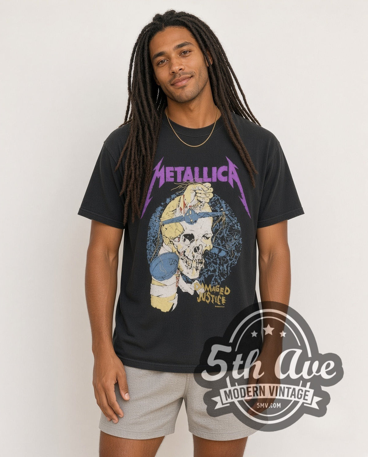 Model wearing the Metallica Damaged Justice Blindfold Scale vintage band t-shirt